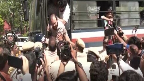 Indian Youth Congress workers protest over disqualification of Rahul