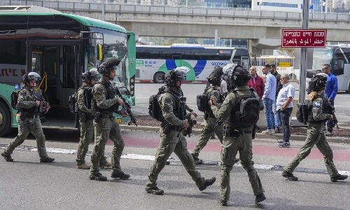 1 killed and 4 wounded in stabbing attack in Haifa, Israeli officials say