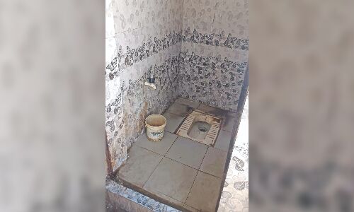 Women, children forced to use toilets without doors in Chennais Vyasarpadi